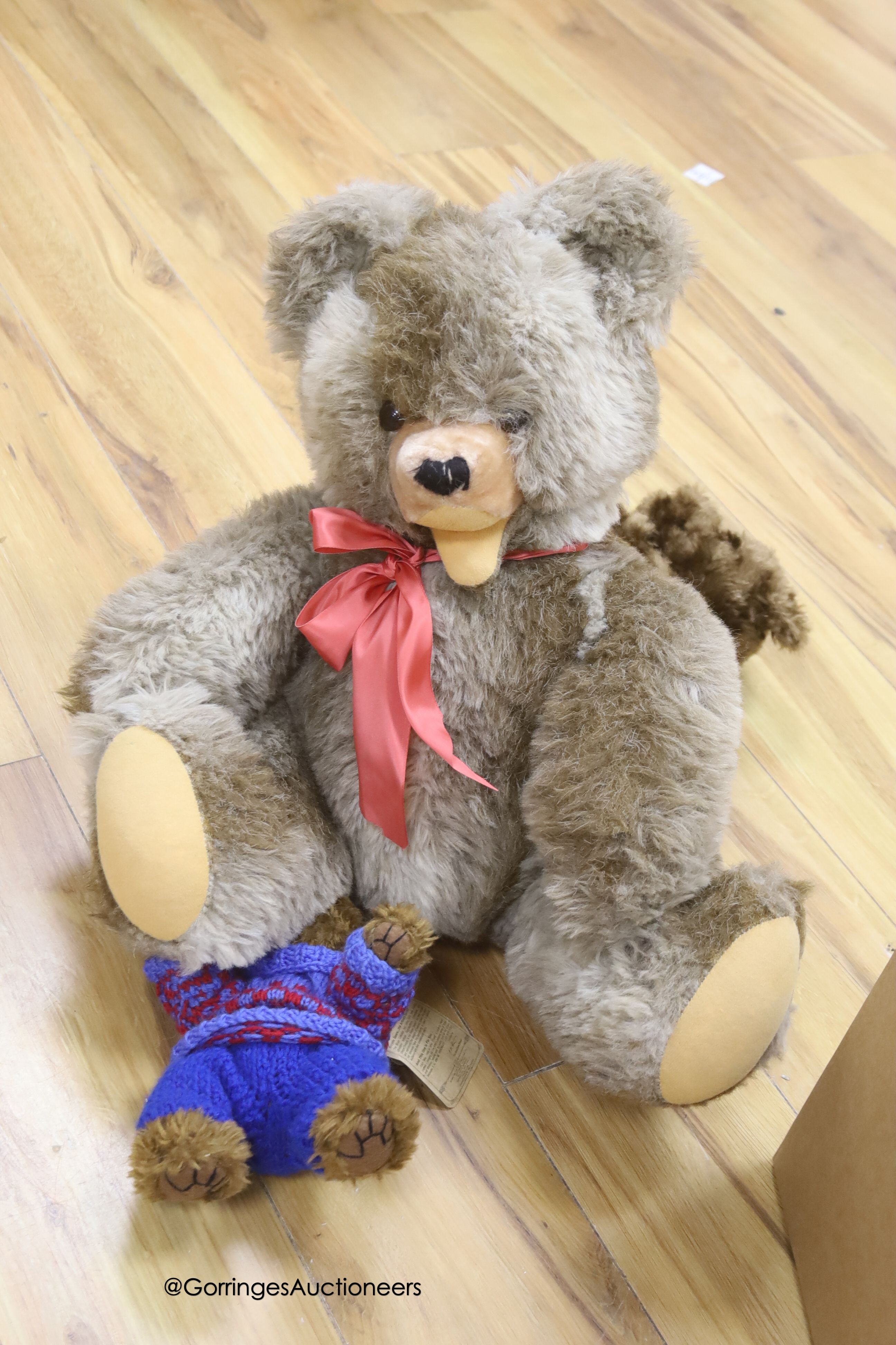 A large Zottytyre bear, two Boyds, Also a modern American bear and large dressed bear